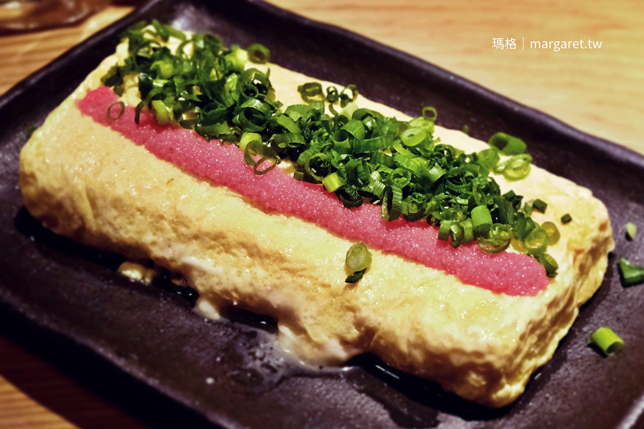 燒鳥炭壹2號店招牌明太子玉子燒，厚實飽滿，高湯滲透蛋液，明太子鹹香與蛋香完美融合。